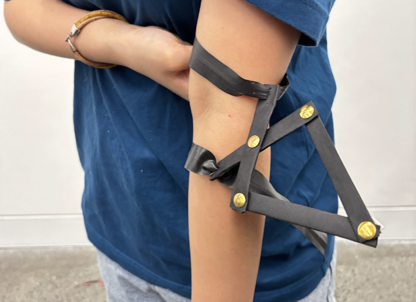 Scissor-hinge mechanism being tested on arm